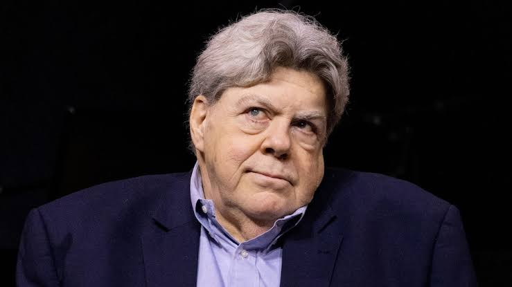 George Wendt as Norm Peterson on Cheers